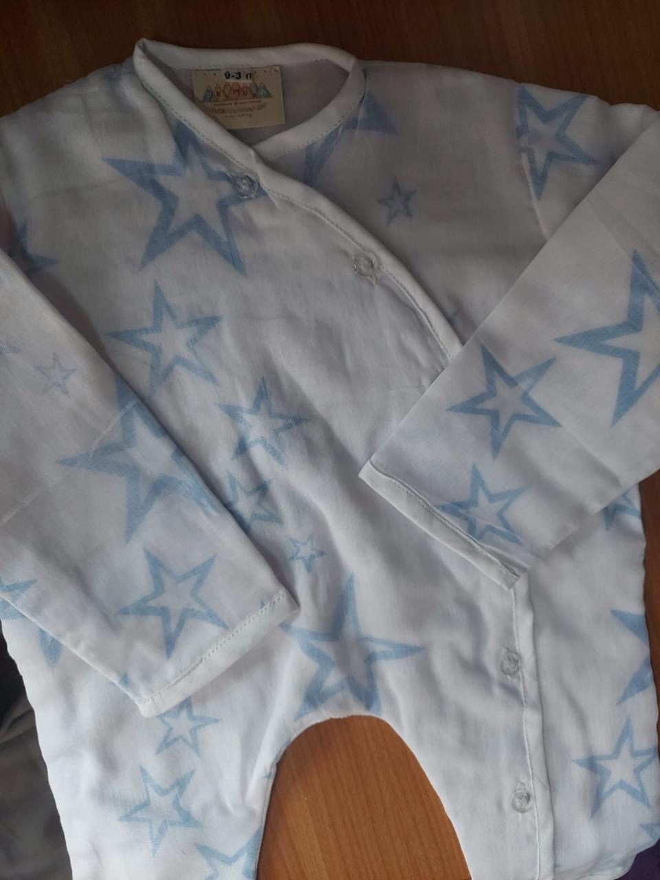 Blue star print cotton kimono pajama top with the Primula 0–3 months label at the collar